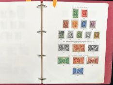 Stamp interest: Red Stanley Gibbons loose leaf illustrated GB stamp album - Partially filled with