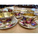 Collection of Aynsley Fruit Decoration Porcelain, comprising three large teacups and saucers,