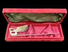 A Bentley Letter Opener, in fitted box. B with wings design, approx. 7" long.