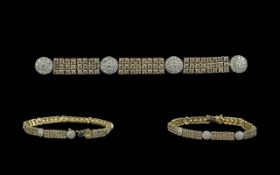 Ladies Attractive 9ct Gold Diamond Set Bracelet - Well designed set with white and champagne