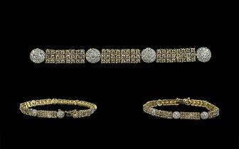 Ladies Attractive 9ct Gold Diamond Set Bracelet - Well designed set with white and champagne