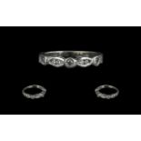 18ct Half Eternity Ring set with round brilliant cut diamonds in a rub over and channel set Ring