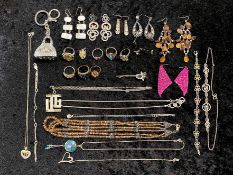 Box of Costume Jewellery, comprising bracelets, earrings, rings, pendants, etc. Odd silver.