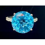 Swiss Blue Topaz Statement Ring, a 12.5ct round cut solitaire topaz of the rich, bright shade