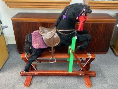 Beautiful Child's Rocking Horse, on wooden rockers, with brown leather saddle and bridle,