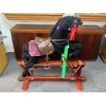 Beautiful Child's Rocking Horse, on wooden rockers, with brown leather saddle and bridle,