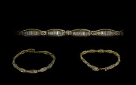 Ladies 14ct Gold Attractive Diamond Set Bracelet. Marked 14ct - 585.