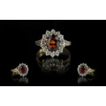 Ladies 18ct Gold Attractive Diamond & Fire Garnet Cluster Ring, flowerhead setting. Diamonds and