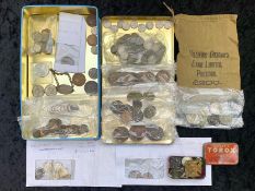 A Tin Containing a Quantity of Coins, to include a 1909 Alaska gold coin, an 1887 silver Florin,