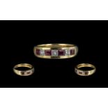 18ct Gold Contemporary Ruby and Diamond Set Band Ring marked 750 full hallmark to interior of shank.