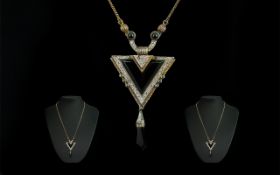 In The Style of The Art Deco Period - Silver Drop Pendant and Necklace,