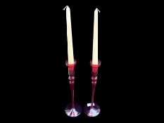 Pair of Tall Red Glass Candlesticks, measure 12" tall.