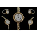 Ladies 1920's 9ct Gold Cased Mechanical Watch with white porcelain dial. Marked to case 9.375.