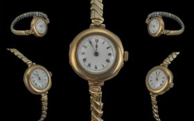 Ladies 1920's 9ct Gold Cased Mechanical Watch with white porcelain dial. Marked to case 9.375.