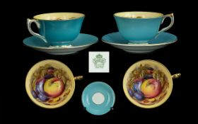 Aynsley Pair of Signed ' Fruits ' Porcelain Cups and Saucers. Signed D. Jones.