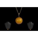 Antique Period Large 9ct Gold Mounted Butterscotch Amber Bead/Pendant Drop, marked 9ct. Attached