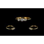 18ct Gold Diamond Ring, set with three round cut diamonds, one chipped, fully hallmarked.