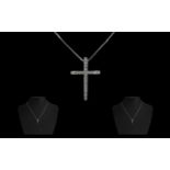 18ct White Gold Diamond Cross and Chain the pendant set with round brilliant cut diamonds.