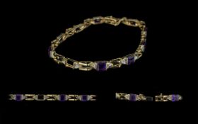 Ladies 14ct Gold Attractive Amethyst & Diamond Set Bracelet. Marked 14ct.
