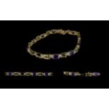 Ladies 14ct Gold Attractive Amethyst & Diamond Set Bracelet. Marked 14ct.