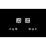 18ct Gold Attractive Pair of Diamond Stud Earrings. Marked 750 - 18ct.
