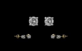 18ct Gold Attractive Pair of Diamond Stud Earrings. Marked 750 - 18ct.