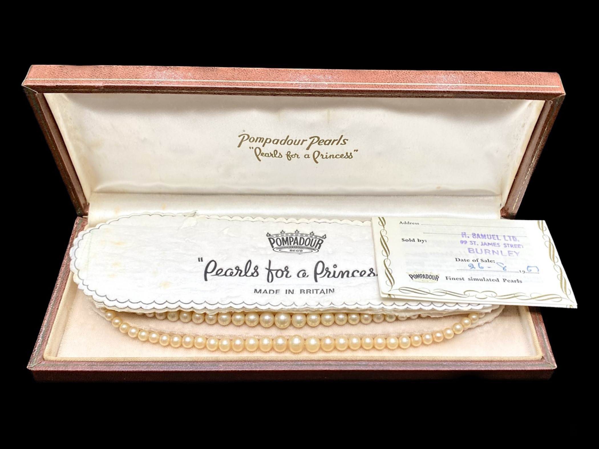 Two Row Pearl Necklace by 'Pompadour Pearls', with stone set clasp, in fitted box.