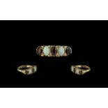 Ladies Attractive 9ct Gold Opal and Garnet Set Ring, In Ornate / Design Setting.