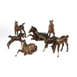 A Collection of 7 Beswick Foals various models to include, model 915 'Foal Lying', and 'Foal