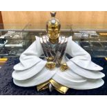 Oriental Porcelain Buddha, in white gloss with gilt finish. Decorative item, 18'' tall x 22'' wide.