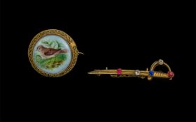 Antique Gilt Metal Brooch in the form of a sword.