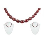 1920's Cherry Amber Beaded Necklace of Good Colour. Weight 15.2 grams. Length 16 Inches - 40 cms.