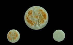 Chinese Jade Amulet of round disc form, engraved decoration. Measures 2" x 2".