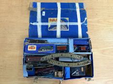 Hornby Dublo Electric Train Set, including track, trains, carriages, power pack and accessories.