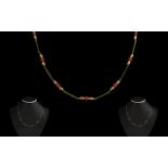 Ladies Attractive 9ct Gold And Red Coral Beaded Necklace/Chain marked 9.375. Excellent design,