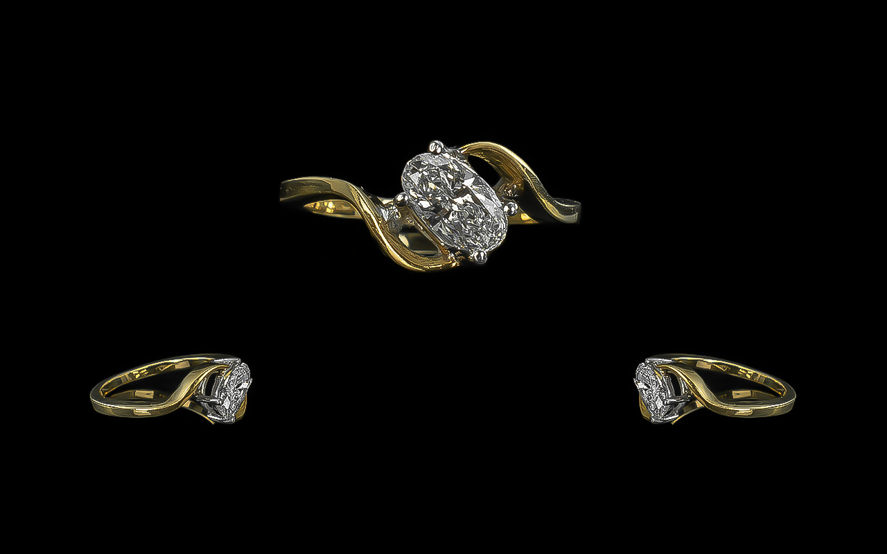 Ladies Superb Quality Contemporary and Attractive 18ct Gold Single Stone Diamond Set Ring.