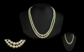 A Fine Quality Vintage Double Strand Cultured Pearl Necklace with 9ct Gold Clasp.