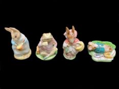 A Collection of Four Figures comprising Beswick Lazybones no 2530,