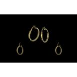 Ladies Pair of 9ct Gold Hoop Earrings By Goldsmiths Jewellers.