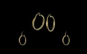 Ladies Pair of 9ct Gold Hoop Earrings By Goldsmiths Jewellers.