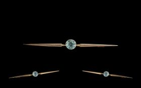 Antique Period Attractive Elongated 9ct Gold Brooch, Set with a Pale Faceted Aquamarine to Centre of