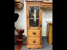 Oak Glass Fronted Cabinet, two drawers beneath a glass leaded door with two interior shelves.
