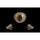 10ct Gents Gold, Garnet Set College Ring - Of Heavy Cast Ornate Shank. Marked 10ct.