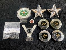 Collection of Vintage Car Badges, assorted designs and shapes, nine in total.