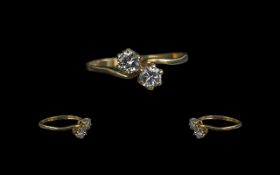 9ct Gold Two Stone CZ Set Ring - Full Hallmark To Interior of Shank. Ring size (P) Weight 1.6 grams.