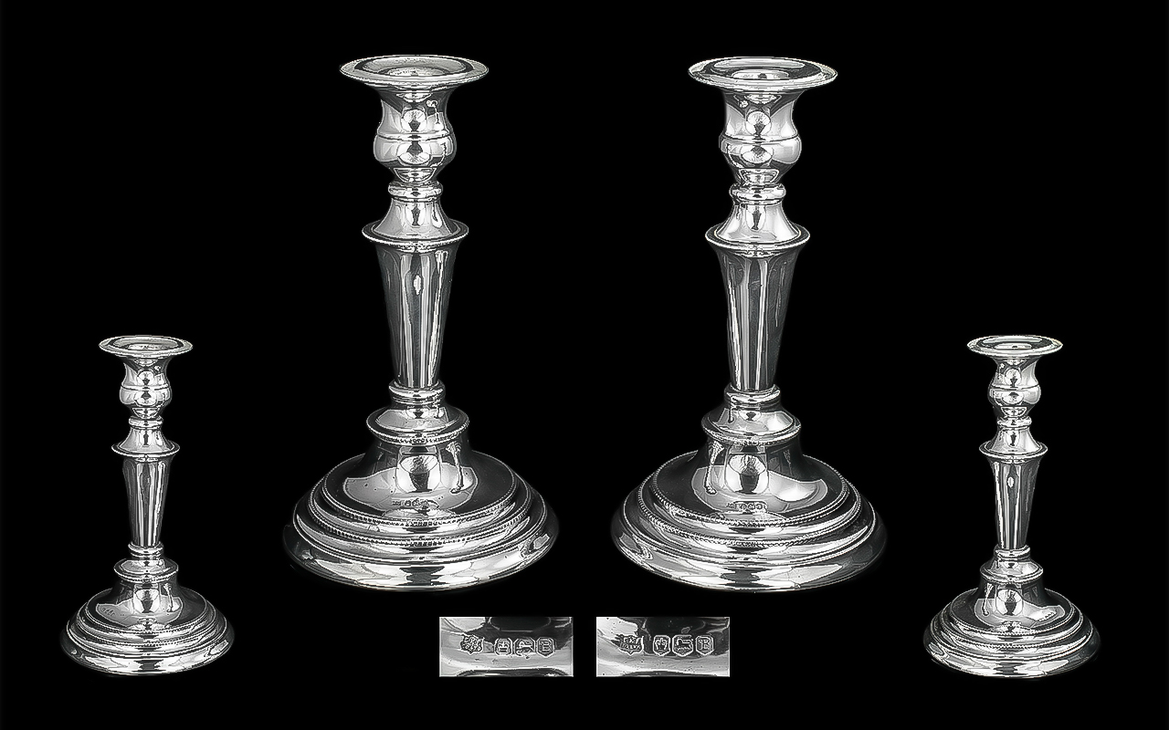 Elizabeth II Fine Pair of Sterling Silver Candlesticks, Raised on Triple Stepped Circular Bases.