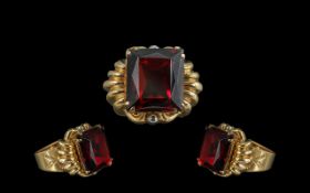 18ct Gold Superb Quality Single Ruby Coloured Faceted Stone Set Ring. Marked 750 to interior of