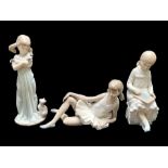 Lladro Figure of a Young Girl with Kittens, 'Don't Forget Me Girl', No. 5743, measures 9" high.