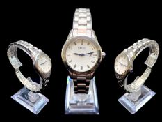 Ladies Seiko Bracelet Watch, silver tone bracelet, white dial with silver batons, date aperture.