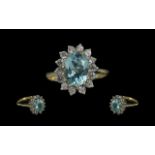 Ladies 9ct Gold Diamond and Aquamarine Set Cluster Ring. Marked 9ct.